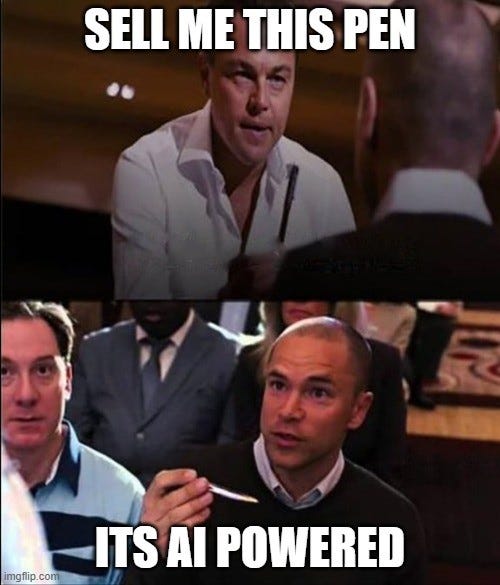 A two-panel meme: top shows a man asking "Sell me this pen," bottom shows another man replying, "It's AI powered."